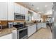Well-equipped kitchen with stainless steel appliances, ample cabinet space, and tile flooring at 6001-1010 S Kings Highway, Myrtle Beach, SC 29575