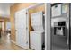 Efficient laundry area with a stacked washer and dryer, offering convenience in a compact space at 6001-1010 S Kings Highway, Myrtle Beach, SC 29575