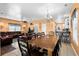 Open-concept living and dining area with ample space, tile flooring, and a cozy leather sofa at 6001-1010 S Kings Highway, Myrtle Beach, SC 29575
