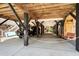 Spacious covered parking area under elevated home, with golf carts and swing at 6001-1010 S Kings Highway, Myrtle Beach, SC 29575
