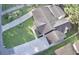 This aerial view features a well-maintained yard, complemented by a spacious, paved driveway at 616 Mckinley Way, Conway, SC 29526