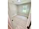 Cozy bedroom with new flooring and natural light from window view at 616 Mckinley Way, Conway, SC 29526