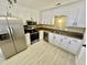 Well-lit kitchen featuring stainless steel appliances, updated cabinetry, and modern countertops at 616 Mckinley Way, Conway, SC 29526
