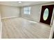 Bright, newly renovated living room featuring sleek flooring and abundant natural light at 616 Mckinley Way, Conway, SC 29526