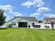 Well-maintained backyard featuring a patio, hot tub, and privacy fence for outdoor enjoyment at 620 Bathurst Dr., Myrtle Beach, SC 29579