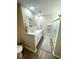 This bathroom features a double sink vanity with granite countertops at 620 Bathurst Dr., Myrtle Beach, SC 29579