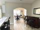 Cozy dining area with a round table, bar stool seating, and an open concept layout at 620 Bathurst Dr., Myrtle Beach, SC 29579
