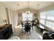 Inviting dining area with natural light, a round table, and comfortable seating for gatherings at 620 Bathurst Dr., Myrtle Beach, SC 29579