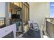 Relax on the balcony with a partial view of the interior living space featuring comfortable seating and a TV at 6804 North Ocean Blvd. # 515, Myrtle Beach, SC 29572