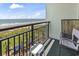 Enjoy the ocean view from the balcony, complete with seating, overlooking the beach and pool at 6804 North Ocean Blvd. # 515, Myrtle Beach, SC 29572
