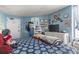 Bright and welcoming bedroom featuring colorful decor and a view of the exit, complete with a soft patterned bedding at 6804 North Ocean Blvd. # 515, Myrtle Beach, SC 29572