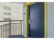 Apartment front door with a yellow frame. The door number is 515 at 6804 North Ocean Blvd. # 515, Myrtle Beach, SC 29572