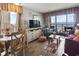 Inviting living room with balcony access and partial ocean view at 6804 North Ocean Blvd. # 515, Myrtle Beach, SC 29572