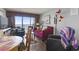 Cozy living room featuring comfortable seating and balcony access with ocean views at 6804 North Ocean Blvd. # 515, Myrtle Beach, SC 29572
