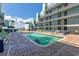 Exterior pool with lounge chairs on the red brick poolside, perfect for relaxation and enjoyment at 6804 North Ocean Blvd. # 515, Myrtle Beach, SC 29572