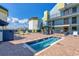 Exterior spa with lounge chairs on the red brick poolside, perfect for relaxation and enjoyment at 6804 North Ocean Blvd. # 515, Myrtle Beach, SC 29572