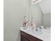Bathroom featuring a vanity with white countertop and a large mirror at 715 Hobonny Loop, Longs, SC 29568