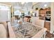 Open-concept floor plan with a dining area flowing into the living room and kitchen at 765 Shaftesbury Ln., Conway, SC 29526