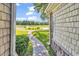 A stone path leads to a golf course and a pond at 765 Shaftesbury Ln., Conway, SC 29526