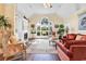 Inviting living room with hardwood floors, fireplace, and ample natural light at 765 Shaftesbury Ln., Conway, SC 29526