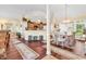 Spacious living area with a dining room, kitchen, and decorative artwork at 765 Shaftesbury Ln., Conway, SC 29526