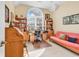 Bright home office with a large window, desk, and ample storage space at 765 Shaftesbury Ln., Conway, SC 29526