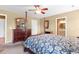 Spacious bedroom showing the bed, dresser, and doorway leading to the attached bathroom at 943 Oak St., Aynor, SC 29511