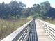 Wooden boardwalk, offering scenic views of surrounding marshland at Lot 142 Millbank Rd., Georgetown, SC 29440
