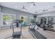 Bright gym with treadmills, elliptical, and weight equipment, perfect for a complete workout at Lot 142 Millbank Rd., Georgetown, SC 29440