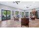 Inviting lounge area featuring comfortable leather armchairs and scenic views of the pool at Lot 142 Millbank Rd., Georgetown, SC 29440