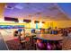 Bowling alley featuring multiple lanes and seating areas with table for dining or relaxing between frames at 1105 S Ocean Blvd. # 128, Myrtle Beach, SC 29577