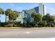 The exterior features tropical landscaping at 1105 S Ocean Blvd. # 128, Myrtle Beach, SC 29577