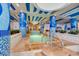 Indoor hot tub area with tiled columns, soft lighting, and easy access at 1105 S Ocean Blvd. # 128, Myrtle Beach, SC 29577