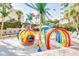 Playful splash pad zone with colorful structures, providing entertainment for children at 1105 S Ocean Blvd. # 128, Myrtle Beach, SC 29577