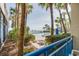 Lounge by this beautiful outdoor pool, surrounded by palm trees and ocean views at 1105 S Ocean Blvd. # 128, Myrtle Beach, SC 29577