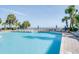 Enjoy the sunny days at this beautiful outdoor pool surrounded by palm trees and ocean views at 1105 S Ocean Blvd. # 128, Myrtle Beach, SC 29577