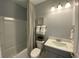 Full bathroom with a shower/tub combo, single vanity and neutral gray walls at 121 Eagle Claw Dr., Carolina Shores, SC 28467