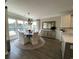 Cozy dining room with ample natural light, modern chandelier, and stylish decor at 121 Eagle Claw Dr., Carolina Shores, SC 28467