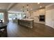 Spacious kitchen featuring a large island, pendant lighting, modern appliances, and an adjacent dining area at 121 Eagle Claw Dr., Carolina Shores, SC 28467
