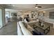 Bright open-concept space featuring living, dining, and kitchen areas at 121 Eagle Claw Dr., Carolina Shores, SC 28467