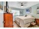 Cozy bedroom with a comfortable bed, wood-look flooring and plenty of natural light at 1301 Pridgen Rd. # 903, Myrtle Beach, SC 29577