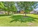 Beautifully maintained community lawn with mature shade trees and grilling area for resident enjoyment at 1301 Pridgen Rd. # 903, Myrtle Beach, SC 29577
