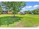 Spacious community lawn featuring lush landscaping, grilling area and a charming gazebo for residents to enjoy at 1301 Pridgen Rd. # 903, Myrtle Beach, SC 29577