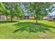 Beautifully maintained community lawn with mature shade trees and grilling area for resident enjoyment at 1301 Pridgen Rd. # 903, Myrtle Beach, SC 29577