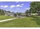 Inviting community pool area with lush landscaping, providing a relaxing outdoor space for residents at 1301 Pridgen Rd. # 903, Myrtle Beach, SC 29577