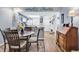 Cozy dining area flows into an open kitchen with modern finishes and natural light at 1301 Pridgen Rd. # 903, Myrtle Beach, SC 29577