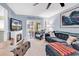 Bright living room featuring comfortable seating, fireplace, and sliding glass doors to the exterior at 1301 Pridgen Rd. # 903, Myrtle Beach, SC 29577