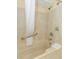 Relaxing bathroom with a jacuzzi tub and shower featuring a neutral-toned design at 1304 N Ocean Blvd. # 200, Myrtle Beach, SC 29577