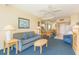 Bright living room and dining area with ocean view, comfortable seating, and open layout at 1304 N Ocean Blvd. # 200, Myrtle Beach, SC 29577