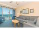 Warm living room with ocean view balcony, cozy seating, and scenic surroundings at 1304 N Ocean Blvd. # 806, Myrtle Beach, SC 29577